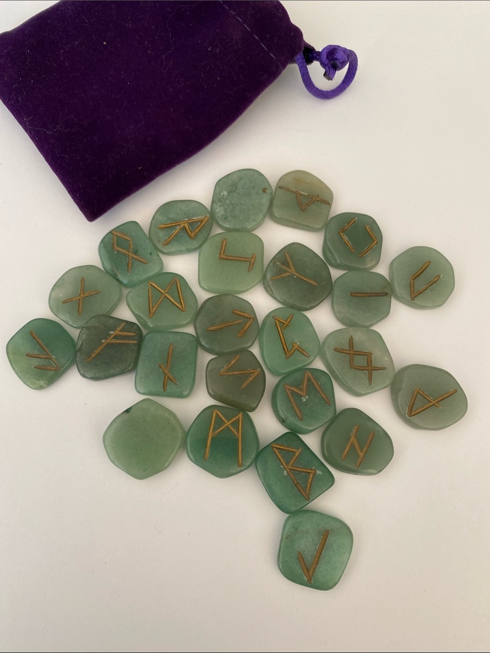 Aventurine elder stones in purple pouch